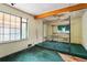 View of the main bedroom with a canopy bed frame and large window at 1258 N Downing St, Denver, CO 80218