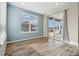 Bright dining area with hardwood floors, sliding door to patio at 10983 Memphis St, Commerce City, CO 80022