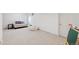 Spacious basement featuring neutral carpet and white walls with seating and storage options at 6075 S Filbert Ct, Centennial, CO 80121