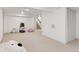 Spacious basement featuring neutral carpet, white walls, and bright lighting at 6075 S Filbert Ct, Centennial, CO 80121