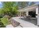 Charming covered patio with comfortable seating, perfect for outdoor relaxation and dining at 6075 S Filbert Ct, Centennial, CO 80121