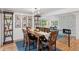 Elegant dining room adjacent to living room and kitchen at 6075 S Filbert Ct, Centennial, CO 80121