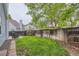 Spacious backyard features a well-maintained lawn, patio seating, and a privacy fence, ideal for outdoor enjoyment at 12060 N Holly Way, Brighton, CO 80602