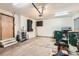 This is a clean two car garage with storage cabinets and lots of room for vehicles and tools at 12060 N Holly Way, Brighton, CO 80602