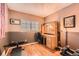 Home office with a desk, wood floors, and a weight bench; great space for working out at 12060 N Holly Way, Brighton, CO 80602
