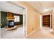 Finished basement with a modern fireplace and accent wall paint, offering flexible living space at 20305 E 41St Ave, Denver, CO 80249