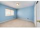 This bedroom has a large window and spacious closet at 20305 E 41St Ave, Denver, CO 80249