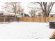 Large backyard with snow, hot tub, and shed at 360 S 30Th Ave, Brighton, CO 80601