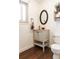 Small bathroom with updated vanity and oval mirror at 360 S 30Th Ave, Brighton, CO 80601