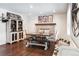 Farmhouse-style dining room with brick fireplace and rustic wooden table at 360 S 30Th Ave, Brighton, CO 80601