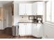 Kitchen corner with white cabinets, coffee bar, and granite countertop at 360 S 30Th Ave, Brighton, CO 80601