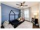 Charming bedroom with wainscotting and light-filtering curtains at 1786 Quartz St, Castle Rock, CO 80109