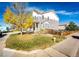 Two-story house with a charming front porch and beautiful landscaping at 1786 Quartz St, Castle Rock, CO 80109