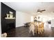 Open-concept living room with a fireplace and wood floors, perfect for entertaining at 1786 Quartz St, Castle Rock, CO 80109