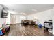 Spacious living room with hardwood floors and ample natural light at 1786 Quartz St, Castle Rock, CO 80109