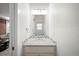 Modern bathroom featuring marble countertop and neutral decor at 3028 N Gilpin St, Denver, CO 80205