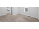 Bright, carpeted bedroom with white walls and base trim at 3028 N Gilpin St, Denver, CO 80205
