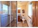 Modern bathroom with a glass-enclosed shower, toilet, and vanity with tile flooring at 5195 Raintree Cir, Parker, CO 80134