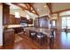 Gourmet kitchen with a marble island, chef's appliances, and wooden cabinets at 5195 Raintree Cir, Parker, CO 80134