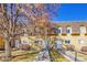 Charming townhouse exterior with well-maintained landscaping and inviting front entrances at 7360 E Princeton Ave, Denver, CO 80237