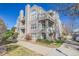 Attractive multi-story condominium building showcasing balconies and manicured landscaping at 5706 W Asbury Pl # 205, Lakewood, CO 80227