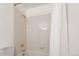 Clean and simple bathroom with a bathtub and shower combination featuring a white shower curtain at 8833 Maplewood Dr, Highlands Ranch, CO 80126