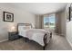 Comfortable bedroom with plush bedding, natural light, and neutral decor for a relaxing space at 8833 Maplewood Dr, Highlands Ranch, CO 80126