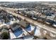 Aerial view of the home showing its location within the community, nearby roads, and surrounding houses at 16102 Grebe Pl, Parker, CO 80134