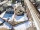 An aerial view of the backyard, showcasing a fenced yard and its proximity to neighboring homes at 16102 Grebe Pl, Parker, CO 80134