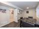 Basement dining room with sleek dark marble table and hardwood floors at 16102 Grebe Pl, Parker, CO 80134