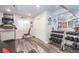 Finished basement gym with weights, mirrors, workout bench, and treadmill at 16102 Grebe Pl, Parker, CO 80134