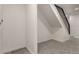 Hallway with stairs, storage and carpet leading to additional rooms at 9400 E Iliff Ave # 103, Denver, CO 80231