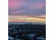 Picturesque city view showcasing sunset over mountains and the skyline at 7865 E Mississippi Ave # 1501, Denver, CO 80247