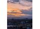 Lovely city view featuring sunset over the mountains and skyline at 7865 E Mississippi Ave # 1501, Denver, CO 80247