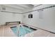 Cozy indoor hot tub with tile surround and rules posted at 7865 E Mississippi Ave # 1501, Denver, CO 80247