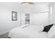 Bright bedroom with ceiling fan, and a double door closet at 12497 W Virginia Ave, Lakewood, CO 80228