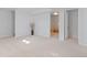 Spacious, carpeted basement offers ample room for various activities and storage at 306 N 14Th Ave, Brighton, CO 80601