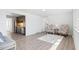 Bright living room showcasing modern flooring, comfortable seating, and seamless access to the adjacent kitchen at 306 N 14Th Ave, Brighton, CO 80601