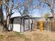 Backyard shed with ample storage and a fenced perimeter at 306 N 14Th Ave, Brighton, CO 80601