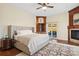 Main bedroom with a fireplace and private access to deck at 4619 Mohawk Dr, Larkspur, CO 80118