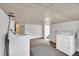 Laundry area in basement with washer, dryer, and neutral tones at 1202 9Th Ave, Longmont, CO 80501