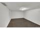 Unfinished basement featuring painted walls, neutral colors, and an overhead light at 1202 9Th Ave, Longmont, CO 80501