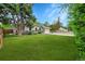 Well-maintained single story home with large manicured front lawn at 1202 9Th Ave, Longmont, CO 80501