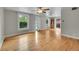 Bright living room boasts hardwood floors, large windows, and contemporary lighting at 1202 9Th Ave, Longmont, CO 80501