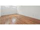 Basement featuring white walls and laminate wood flooring at 2654 Forest St, Denver, CO 80207