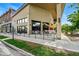 Outdoor dining at a commercial building with a covered patio space at 2654 Forest St, Denver, CO 80207