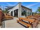 Charming building exterior with outdoor seating and decorative awnings at 2654 Forest St, Denver, CO 80207