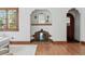 Living room fireplace with decorative archway and mantle at 2654 Forest St, Denver, CO 80207