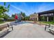 Beautiful community playground featuring slides, swings, and ample play area at 2654 Forest St, Denver, CO 80207
