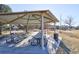 Community picnic pavilion with tables at 11844 Oak Hill Way # A, Commerce City, CO 80640